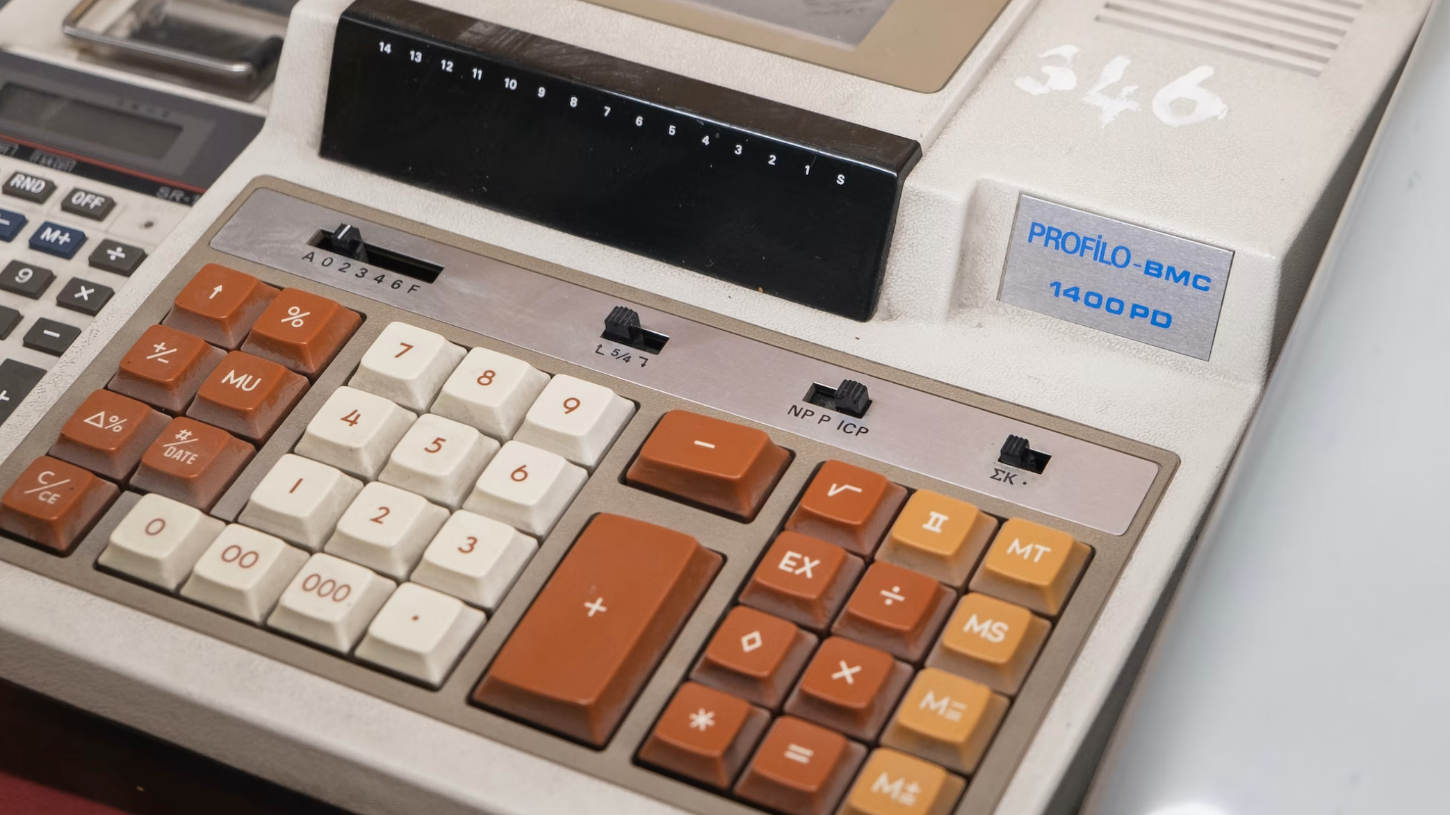 Go Red for Dyslexia: Dyslexia Awareness Through the Ages 7 old-fashioned keyboard input device in shades of beige and orange